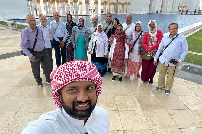 Abu Dhabi Tour Grand Mosque Heritage Village Emirates Palace - Al Mina Fish Market and dates for the road