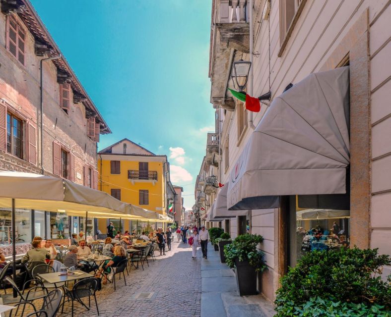Alba: Historic Town Highlights Guided Walking Tour - Towers, houses, and the old town skyline