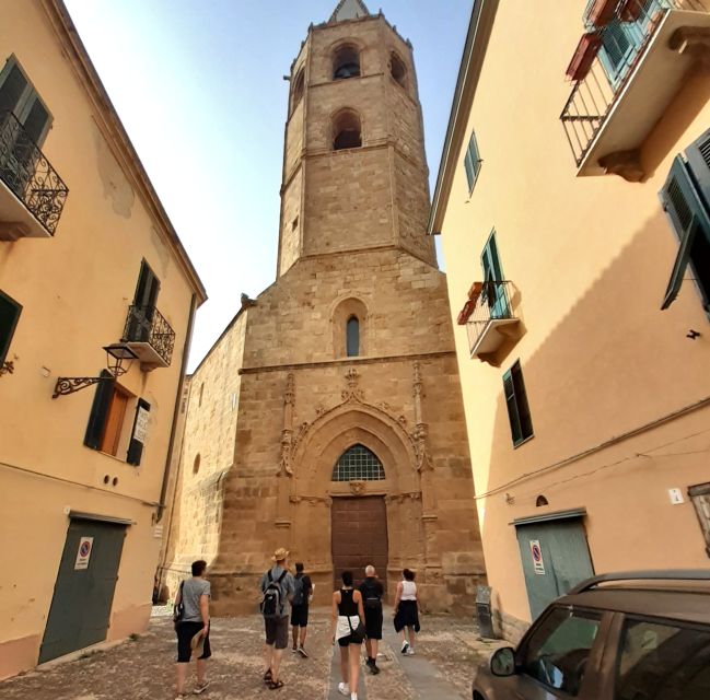 Alghero: Historic Center Walking Tour with A Local Guide - Following the Aragonese towers and sea walls