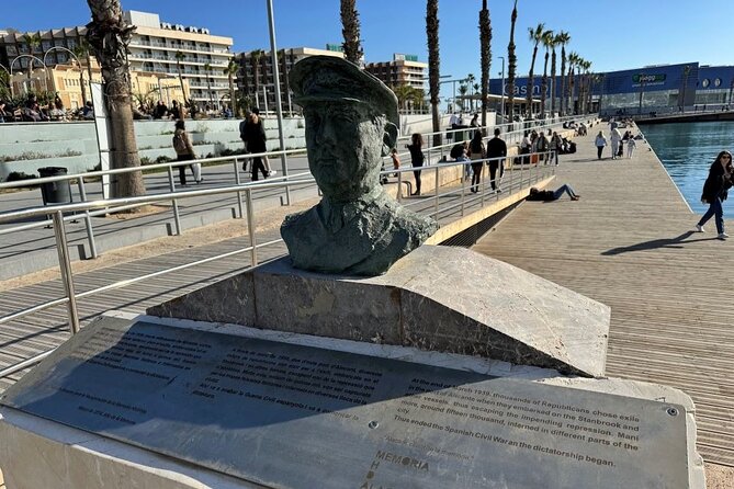 Alicante’s History and Highlights: Self-Guided Walking Tour - Calle Jorge Juan and a local figure