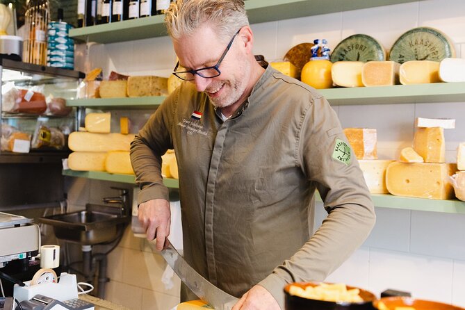 Amsterdam High-End Dutch Food & History Tour - Up to 8 guests - Fish shop flavors: herring, cod, and smoked eel