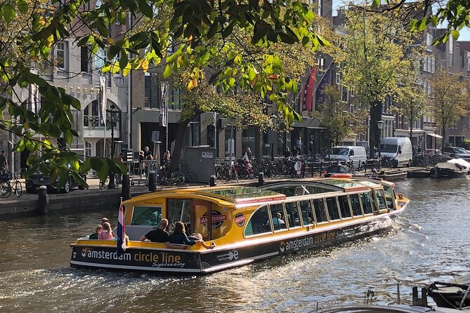 Amsterdam: Historic City Sightseeing Canal Cruise - A historic church and Amsterdam Centraal