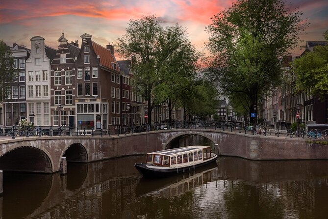 Amsterdam Historic Tour On Classic Saloon Boat - The church, opera house, and everyday city views