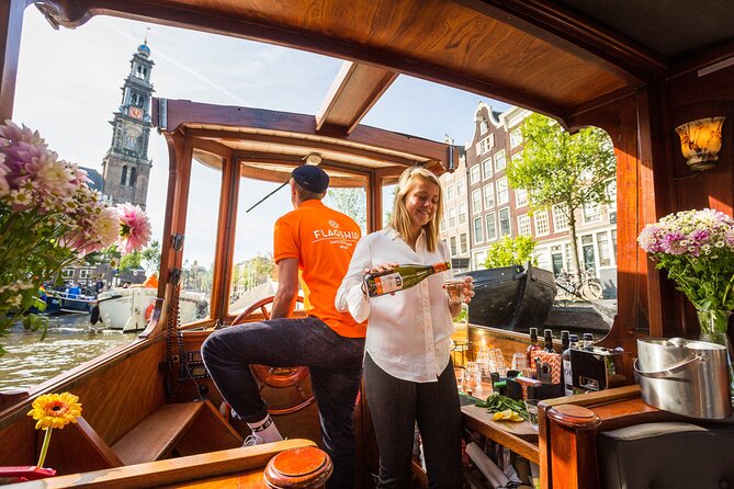 Amsterdam Historic Tour On Classic Saloon Boat - Drinks, cheese, and the social atmosphere