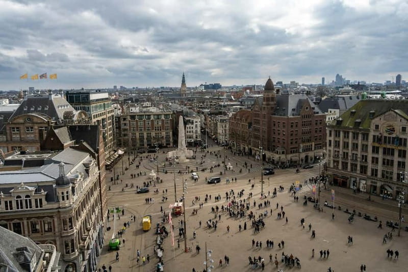 Amsterdam: Iconic Canals & Historic Sights Walking Tour - Why this two-hour walk works as an Amsterdam introduction