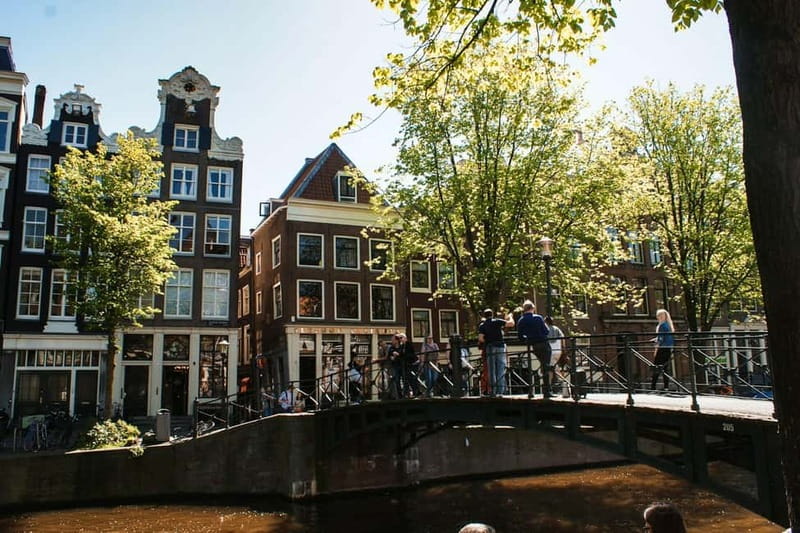 Amsterdam: Iconic Canals & Historic Sights Walking Tour - The Jewish Quarter and wartime memory