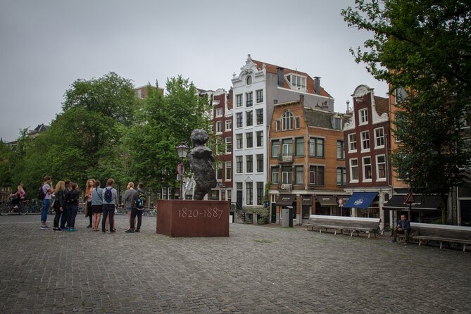 Amsterdam Private Historical Walking Tour - Bloemenmarkt is colorful, but keep expectations clear