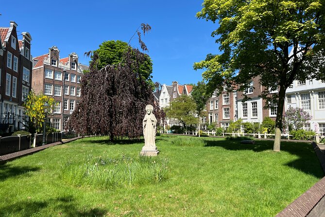 Amsterdam Walking Tour: Urban Legends & History with local guide - Rokin and the Miracle of Amsterdam