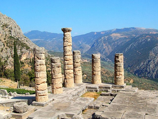 Ancient Delphi Full-Day Tour from Athens - Walking through the Temple of Apollo and sanctuary