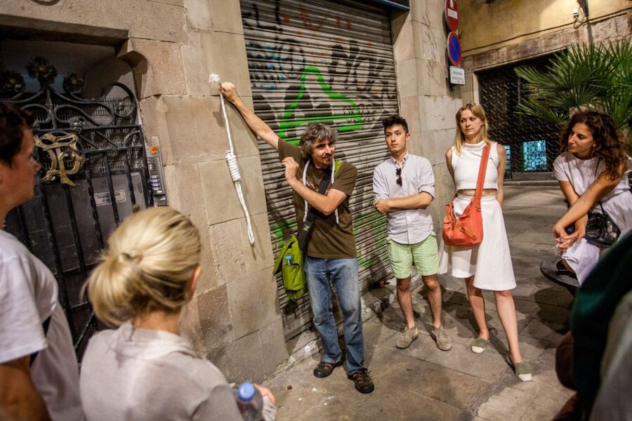 Barcelona: Dark History Night Walking Tour - Props, projections, and a lively guide