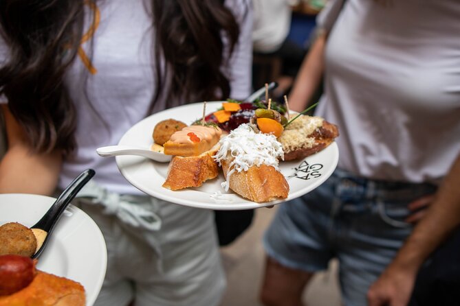 Barcelona Tapas Food Tour, Taverns, History & Local Culture - Rambla de Catalunya and the city’s famous boulevard