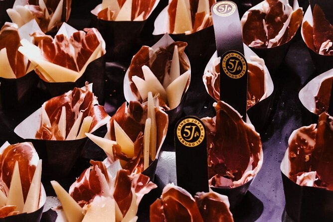 Barcelona Tapas Walking Tour: Food, Wine & History - Four stops, four chances to eat well