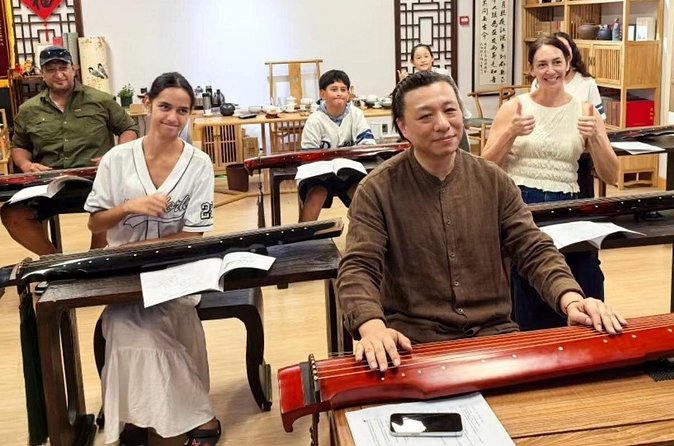 Beijing Culture: Tea Ceremony, Heritage Instrument & Calligraphy - A small group changes the feel