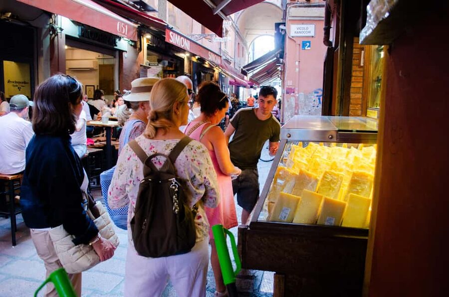 Bologna: Street Food Tour in the Historic Center - Stop one: Parmigiano, balsamic vinegar, tigelle, and lardo