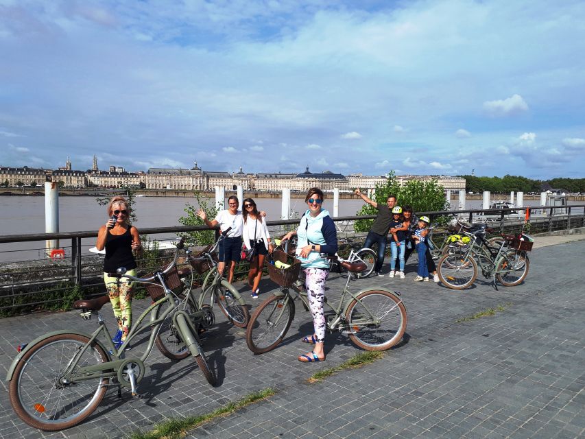 Bordeaux: Top Landmarks & Historic Bike Tour - Pont de Pierre and the first Garonne views