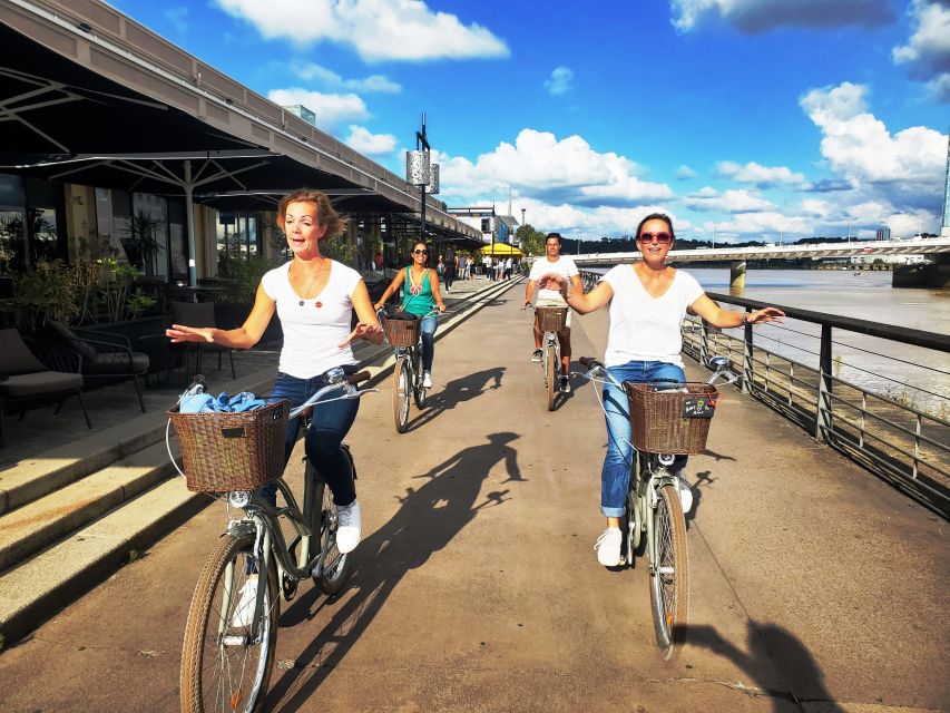 Bordeaux: Top Landmarks & Historic Bike Tour - Quinconces, the Golden Triangle, and the grand center