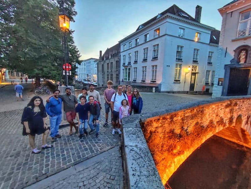 Bruges: Nightly Tales and Untold History Walking Tour - Burg Square and the stories behind grand buildings