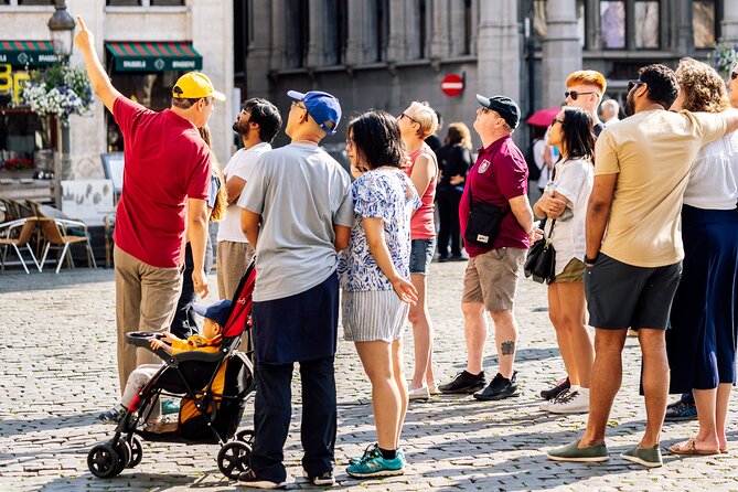 Brussels: Historical Walking Tour with Chocolate & Waffle Tasting - Grand Place: read the stories in the stone