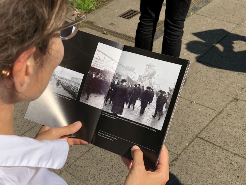 Cologne: Old Town Historical Walking Tour with GEO Epoche - Fischmarkt: a scenic stop with layers beneath it