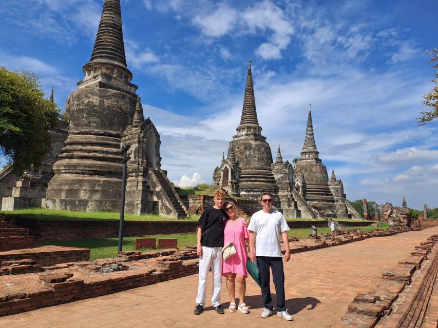 Colors of Ayutthaya: UNESCO Heritage 6 hour Bicycle Tour - Wat Mahathat and the Buddha head in the roots
