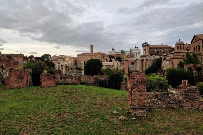Colosseum & Ancient Rome Guided Walking Tour - Entering the Colosseum and understanding its purpose
