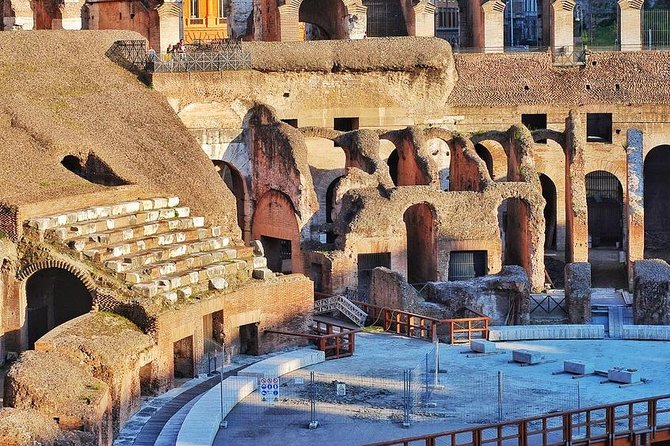 Colosseum Express Guided Tour and Ancient Rome Admission Included - Entering the Colosseum and seeing the arena