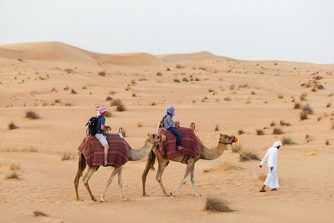 Dubai Camel Desert Safari, Traditional Meal & Heritage Activities - Leaving Dubai for the Conservation Reserve