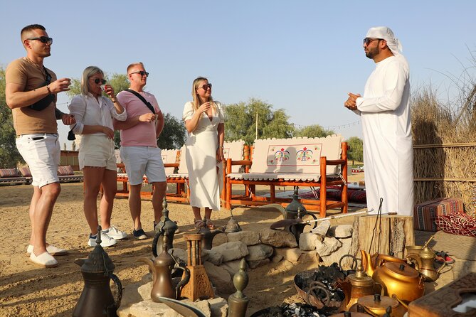 Dubai Evening Heritage Safari by Vintage G Class Al Marmoom Oasis - Sunset, Arabic clothing, and the falcon encounter