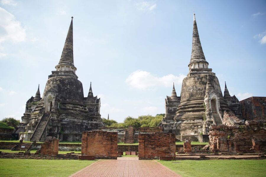 From Bangkok: Ayutthaya Historical Day Tour by Bus - Wat Mahathat and the Buddha head in tree roots