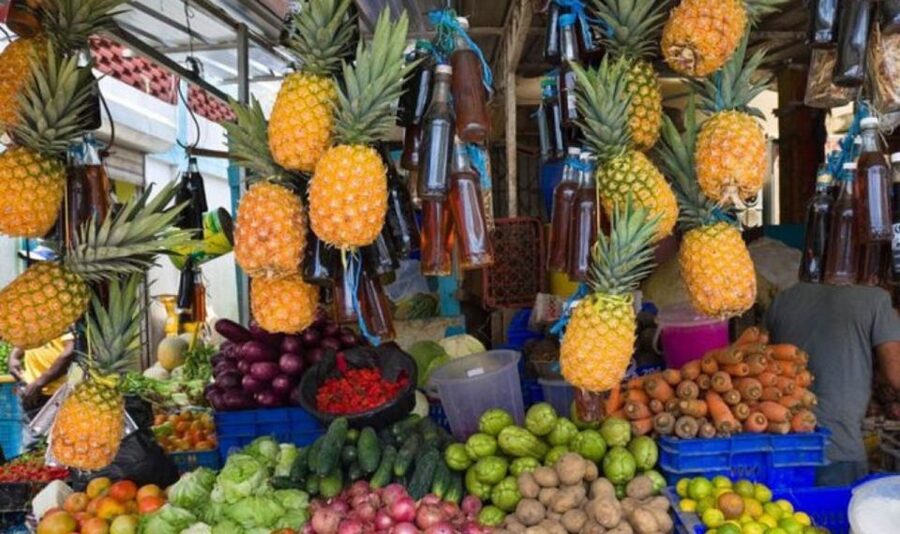 From Punta Cana: History and Culture Tour with River Swim - The agricultural market and souvenir stops