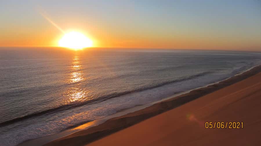 From Walvis Bay: Sandwich Harbour World Heritage Site - Sandwich Harbour, where dunes meet the Atlantic