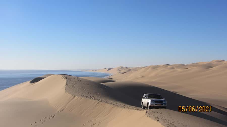 From Walvis Bay: Sandwich Harbour World Heritage Site - Optional sandboarding for a little extra fun