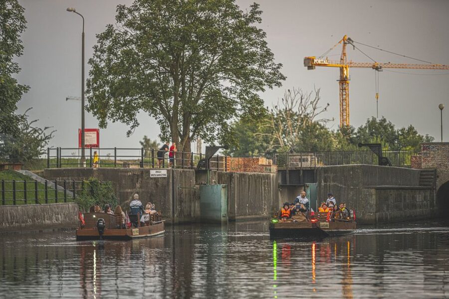 Gdansk: City Cruise on Historical Polish Boat - The port cranes, submarines, and working Gdańsk