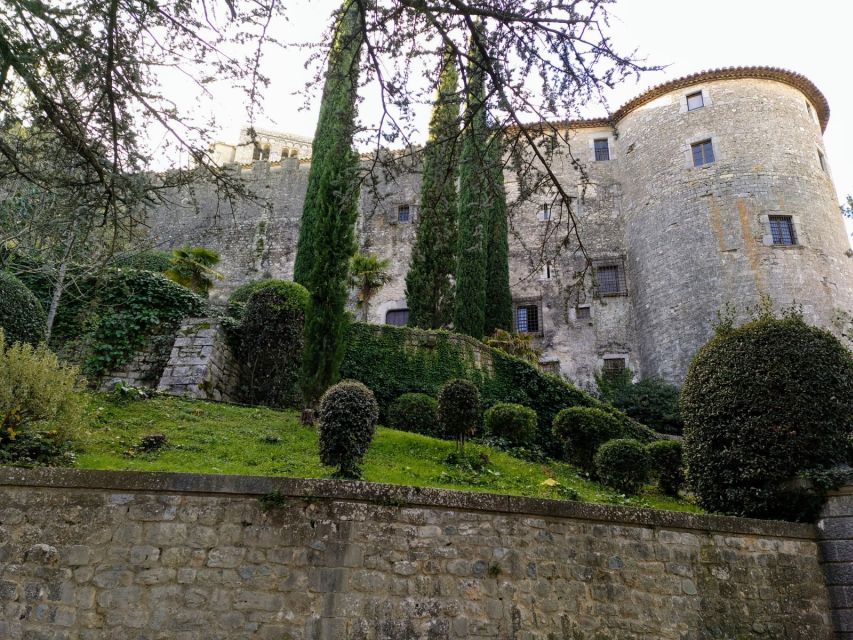 Girona: Jewish Heritage Guided City Tour and Museum Visit - Entering Girona’s Barri Vell beside Plaça Sant Feliu