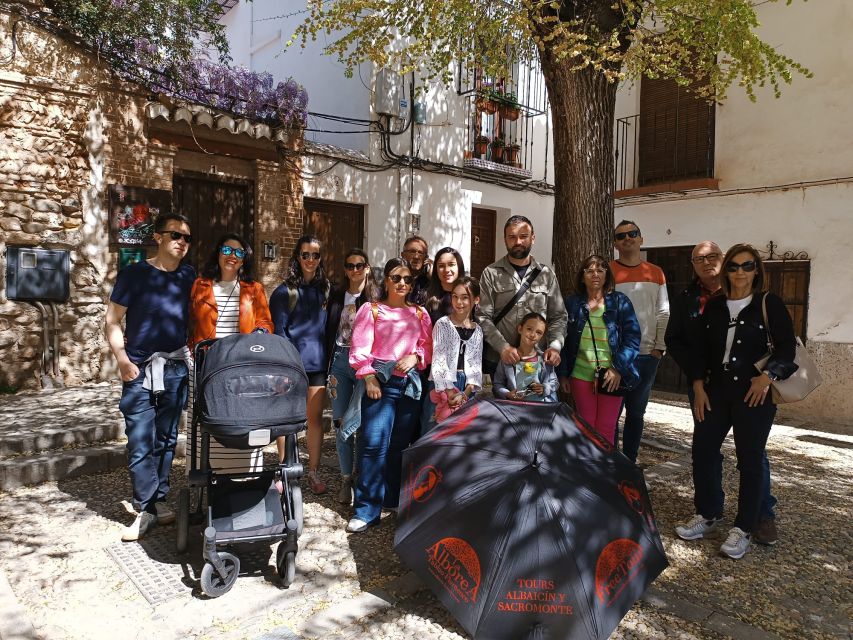Granada: Historic Center and Lower Albaicin Walking Tour - Corral del Carbón and Granada’s Commercial Past
