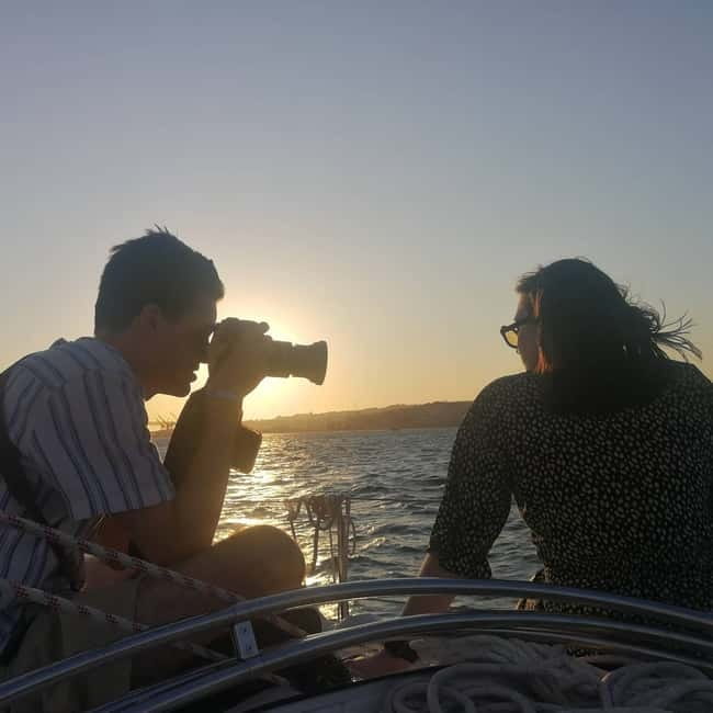 Lisbon: Daytime or Sunset Boat Cruise with History and Wine - Sunset, city lights, and the green wine service