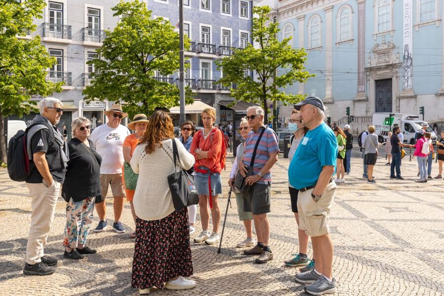 Lisbon: History, Stories and Lifestyle Walking Tour - Santa Justa and Baixa show two sides of central Lisbon