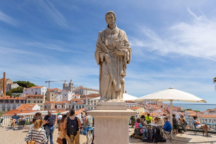 Lisbon: History, Stories and Lifestyle Walking Tour - Portas do Sol frames Alfama and the Tagus