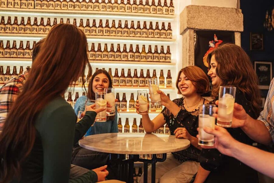 Lisbon: Private Dark History Walking Tour with Drinks - The final stop in Bairro Alto