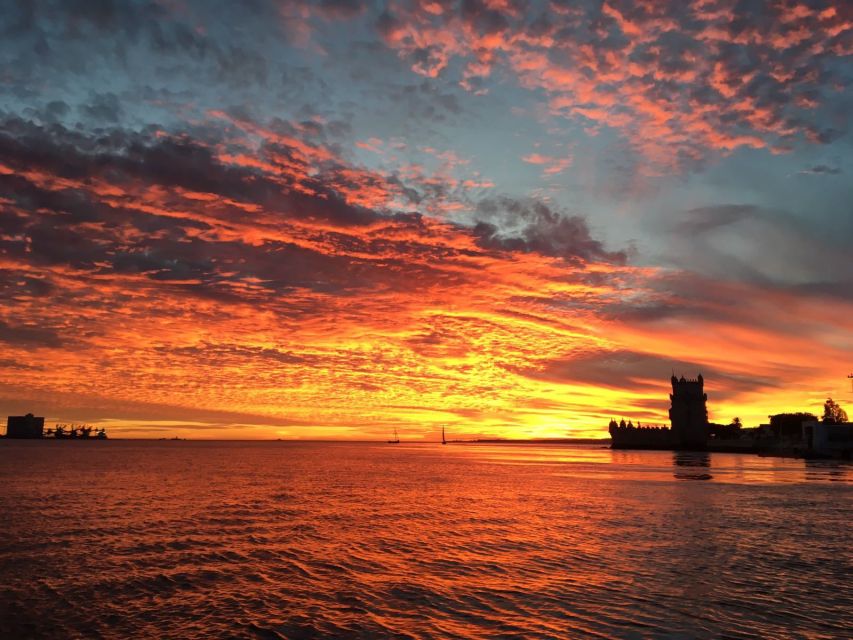 Lisbon: Sunset Sailing with Portuguese Wine and History - Wine, blankets, music, and the social mood