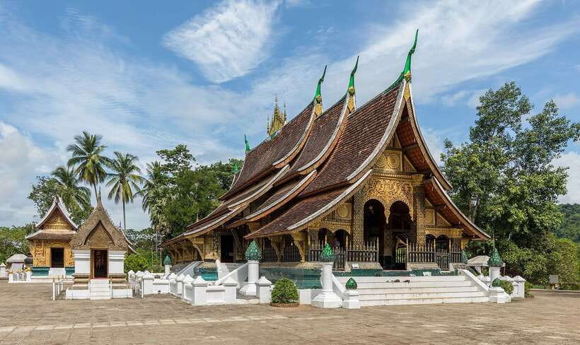 Luang Prabang: UNESCO World Heritage City Highlights Tour - Wat Xieng Thong and the low roofs of Luang Prabang