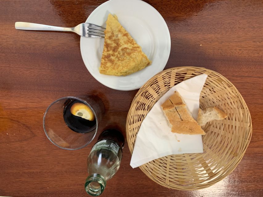 Madrid: History of Tapas Walking Tour and Tasting - Local bars and restaurants, with some uncertainty