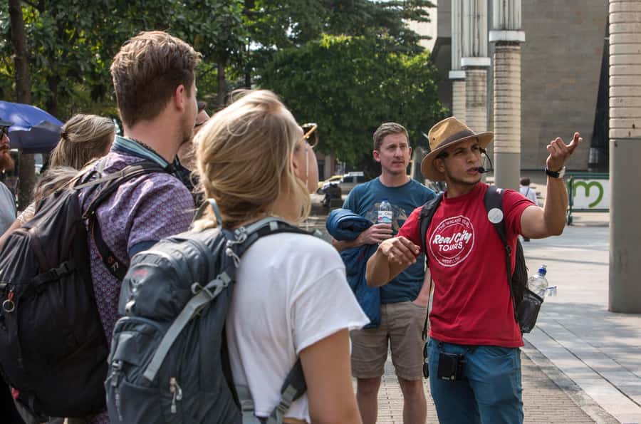 Medellin Historic Walking Tour - National Palace Mall and the value of free time