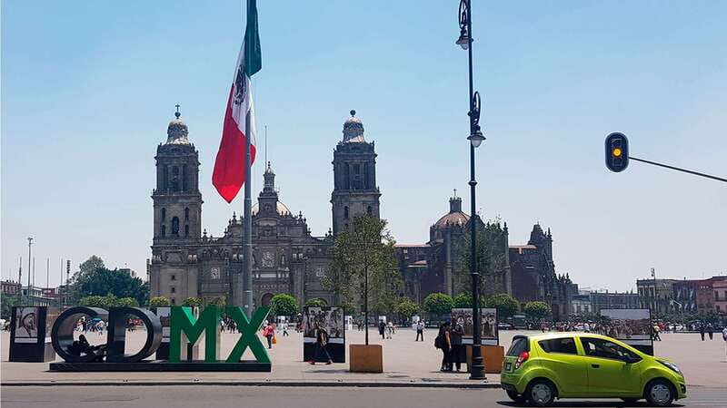 Mexico City: Historic Downtown Walking Tour - Standing beside the Templo Mayor ruins