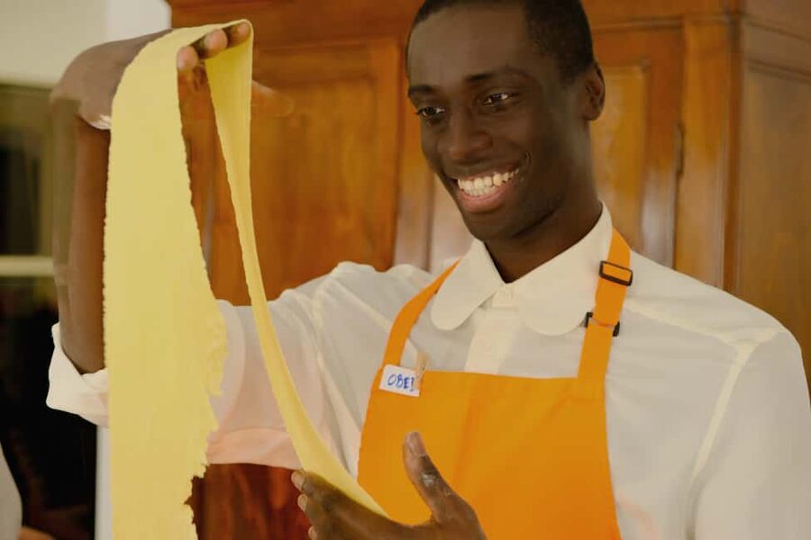 Milan: Fresh Pasta and Tiramisù Class in A Historical Home - Cooking pasta inside a Milanese family home