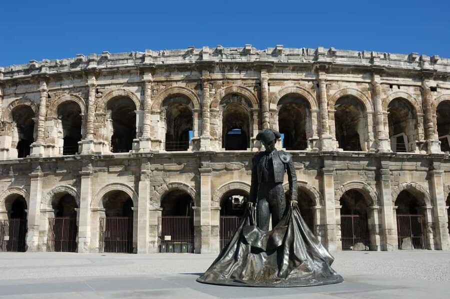 Nimes: Ancient Roman Arena Ticket & Old Town Audio Tour - Inside the Roman amphitheatre