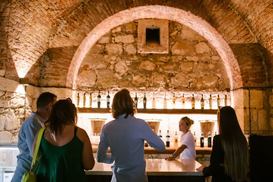 Pastrengo: Lake Garda Wine & Food Tasting in Historic Fort - Entering through the golden eagle gate