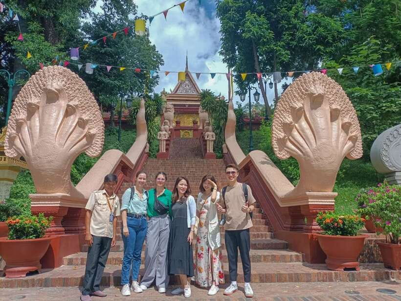Phnom Penh Historical Sites Tour by Tuk Tuk - Praying at 14th-century Wat Phnom