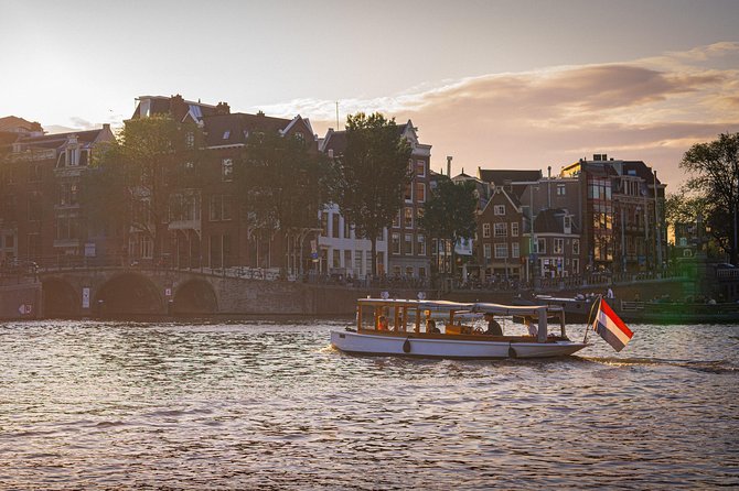 Private Boat Tour Amsterdam - 90 Min incl. welcome drink on historic saloon boat - Booking, weather, and cancellation advice