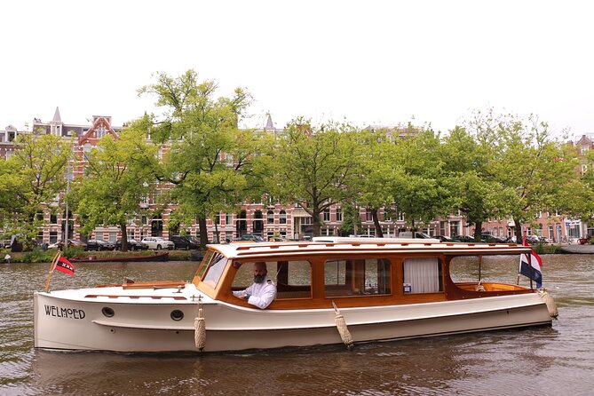 Private Guided Historic Amsterdam Canal Cruise in a Salon Boat - The Maritime Museum and the Dutch East Indiaman